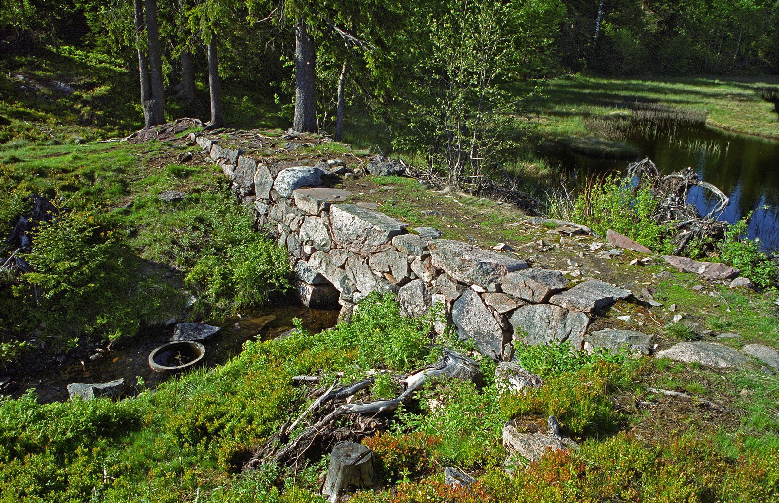 Sundvolden Møllebrug: Demningen ved Retthelltjern